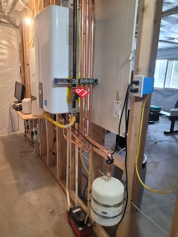 Licensed plumber repairing a kitchen sink in Stock Island