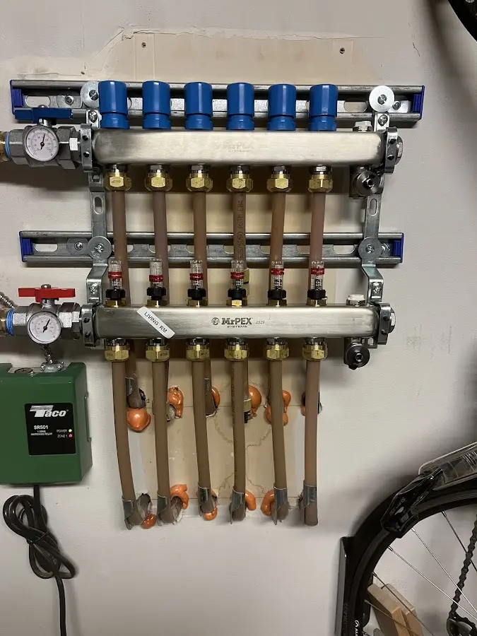 Plumber performing Water Heater Repair at a residential property in Stock Island